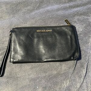 Michael Kors black wristlet -good condition
